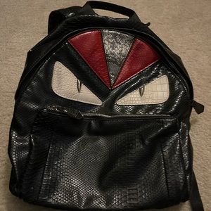 Fendi backpack gently used. Missing one zipper pull per photo
